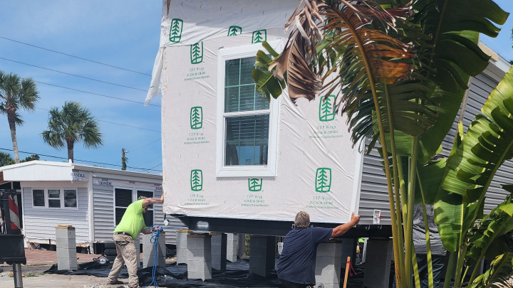 Installing new home at 413 Dije St.<br> Photos by Dan Mclean - Slide 5 width=
